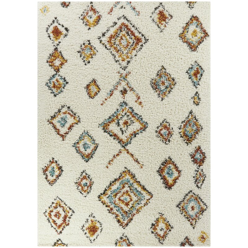 Handmade Moroccan shag rug with colorful diamond pattern in rust orange and turquoise on ivory cream base - boho berber style area rug