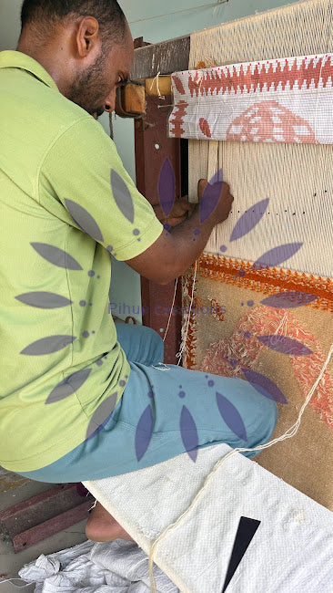 Hand knotted rug being made by an Artisan in Bhadohi